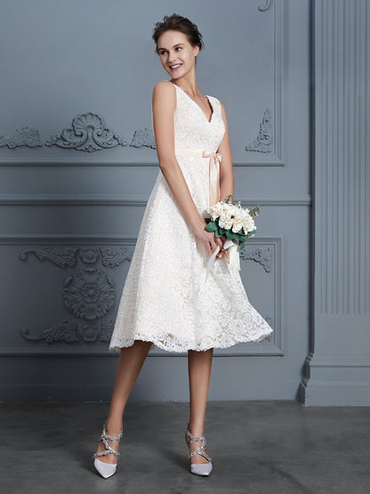 A-Line/Princess V-neck Sleeveless Knee-Length Lace Bowknot Wedding Dresses